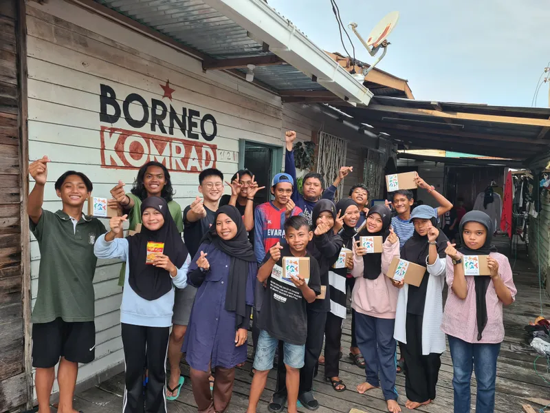 Borneo Komrad teens with their kits
