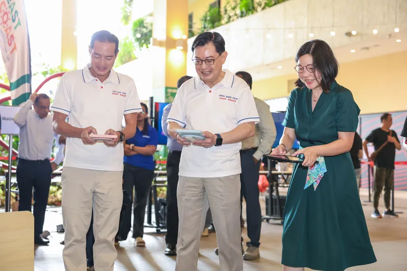 Senior Minister Heng Swee Keat driving a Stick ’Em robot car