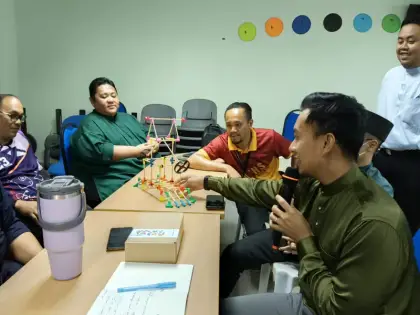 A Brunei teacher presents their car