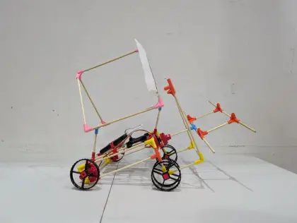 A cart with a leaning paper flag