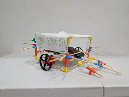 A cart with green flags and handwritten notes