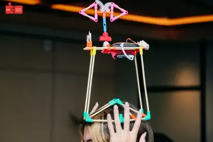 A chopstick structure balanced on fingertips