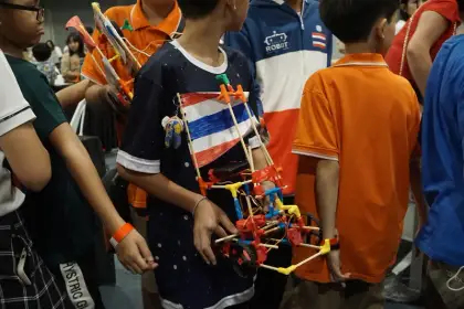 Carrying a build flying the Thai flag