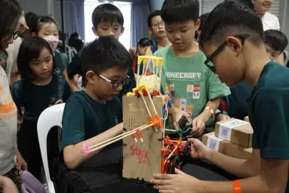 A Minecraft fan builds at the Games
