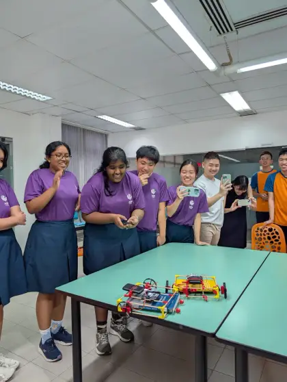 Girls test their robot car