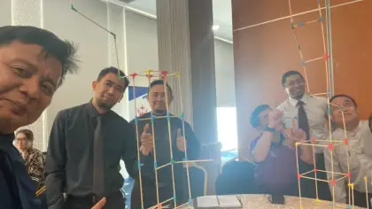 Teachers framed through their towers
