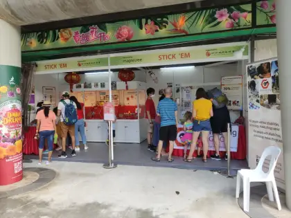 The Stick 'Em booth at a fair