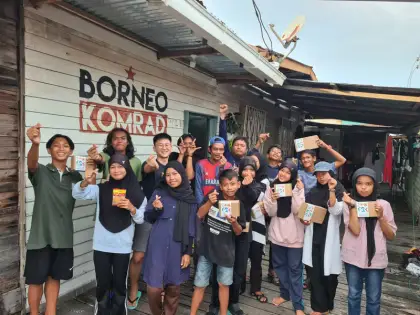 The team outside Borneo Komrad with new kits