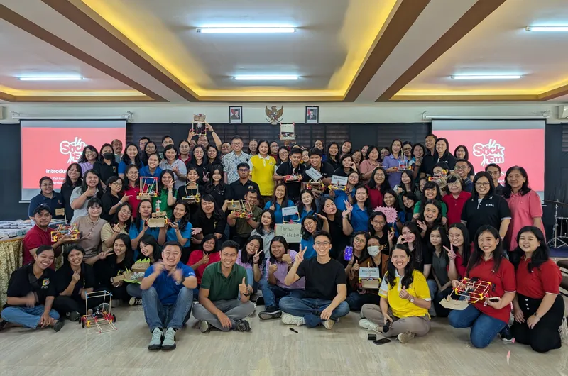 Teachers at the Stick ’Em workshop in Jakarta with their builds